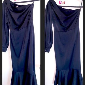 One sleeve sleek small black dress